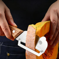 Nieuwe multifunctionele schilmes met houten handvat, nieuwe roestvrijstalen fruit- en groenteschiller voor pompoen en sla.