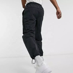 OEM toptan spor giyim Polyester naylon siyah Jogger taktik rüzgarlık eşofman altları özel Logo teknoloji dokuma erkek kargo pantolon - Product Image 3