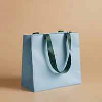 Sac cadeau en papier kraft de luxe bleu avec ruban Logo et taille personnalisables pour la Saint-Valentin Emballage de vêtements et de cadeaux