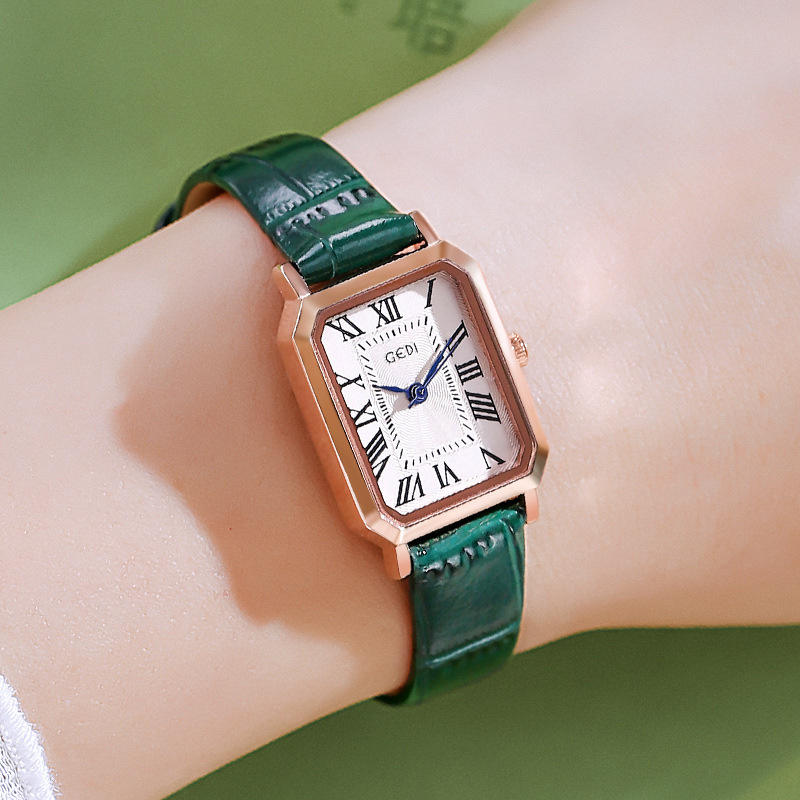 Rose gold shell, white plate and green band