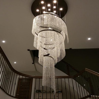 Lustre moderne pour escalier, grand luminaire de luxe en cristal pour plafond haut, lustre en chaîne de cristal en spirale effet goutte de pluie