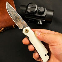 Couteau de poche EDC pour le camping et la randonnée en plein air avec manche en os de vache et lame en acier damas cuivré pour la défense personnelle