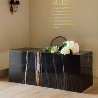 Table de réception en marbre naturel pour spa, designs de comptoirs d'accueil en marbre Calacatta noir avec logo