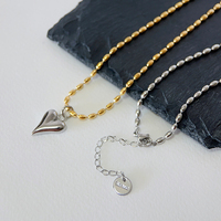 Collier ras du cou en acier inoxydable plaqué or 18 carats, pendentif cœur poli miroir bicolore, chaîne courte contrastante