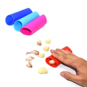 Utensili da cucina per spelatura dell'aglio in Silicone creativo all'ingrosso efficaci presse per aglio gadget morbidi pelapatate per spremiaglio