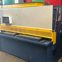Kullanılmış Çok Fonksiyonlu Hidrolik CNC Kesme Makinesi Metal Levha Sabit Uzunlukta Kesme Makinesi Asansör Kabin Kapısı İşleme İçin