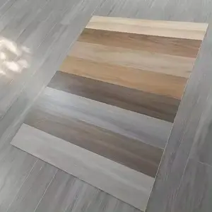 Ingrosso nuovo Design OEM spessore piastrelle in legno effetto piastrelle in ceramica pavimento in legno per casa camera da letto