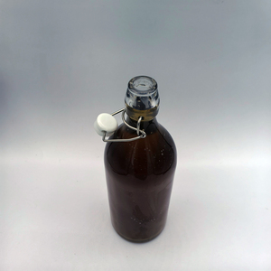 Bouteille en verre transparente ronde de 1000 ml (535 g) avec bouchon à bascule en métal, prix usine, fournisseur direct, <span class=keywords><strong>moins</strong></span> <span class=keywords><strong>cher</strong></span> - Product Image 3