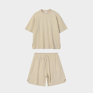 Conjunto de Dos Piezas Unisex de Algodón, Camiseta de Cuello Redondo y Pantalones Cortos con Cintura Elástica, Color Sólido, Corte Holgado, Ropa Casual de Verano - Product Image 3
