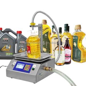 Machine de remplissage liquide par pesage, machine de remplissage de bouteilles adaptée au vin, à l'huile alimentaire, aux boissons, aux détergents, au shampoing - Product Image 1