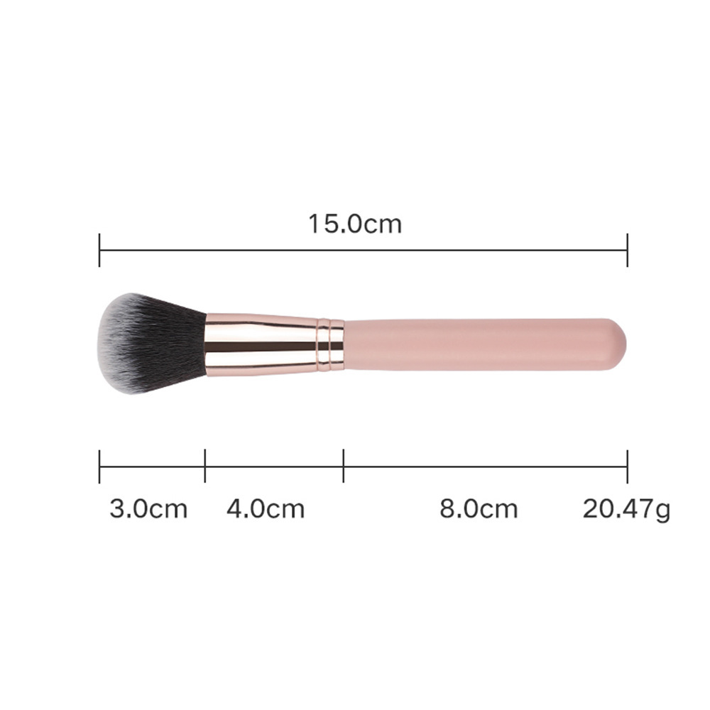 Brocha para polvos de madera rosa con mango.