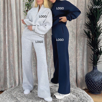 Ensemble de survêtement deux pièces personnalisé pour femme en molleton de coton d'hiver, comprenant un sweat à capuche demi-zip et un pantalon de jogging à fente, orné de strass et de pompons, avec broderie