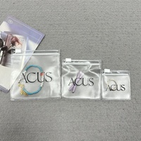 Bolsas pequeñas y bonitas con cierre de cremallera de plástico para joyería con logotipo personalizado, dijes de joyería, bolsa transparente con cremallera para joyería, bolsas de cosméticos de PVC