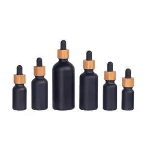 Botol Minyak Esensial Kaca Hitam Matte 15Ml 20Ml 30Ml 50Ml 100Ml Botol Minyak Esensial Kaca Hitam Matte dengan Penitis Kayu Bambu