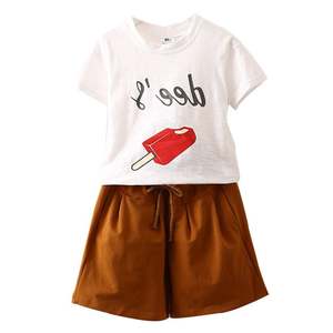 Conjunto de Ropa de Algodón Indio: Pantalones y Camiseta Ringer para Niña con Detalle de Mano - Lote de Stock - Los Diez Productos Más Vendidos en China - Product Image 1