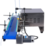 Machine de remplissage automatique de liquides à pompe magnétique de petite taille pour la production de bouteilles d'huiles essentielles, de parfums et de cosmétiques