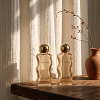 Vente en gros de flacons de parfum en verre transparent de 30, 50 et 100 ml avec vaporisateur haut de gamme, possibilité de personnalisation