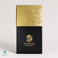 Boîte cadeau rigide de luxe noire et or avec enveloppe, doublure en éponge, impression offset, texture gaufrée, personnalisable pour la vente en gros