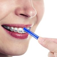 40 pièces/sac, anneaux élastiques orthodontiques multicolores, ligatures en forme de V, élastiques en caoutchouc, matériel dentaire