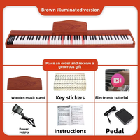 Factory Wholesale Foldable Portable Beginner Home 88-Key Plastic Electronic Piano Keyboard with USB Type C 200 Rhythms 200 Tones