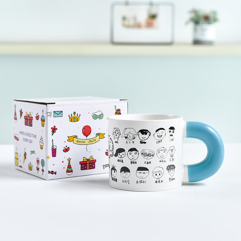 Matte white chubby cup with blue handle and cartoon color box
