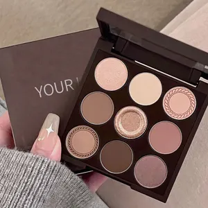 Tùy chỉnh 9 trong 1 Facial Eyeshadow Palette OEM trang điểm Eyeshadow cao sắc tố duy nhất Matte Eyeshadows mỹ phẩm trang điểm