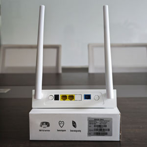 Listo para Enviar: ZC-502W XPON ONU 1GE+1FE 2.4G WiFi Módem GPON Router Óptico FTTH para Internet Doméstico - Product Image 4