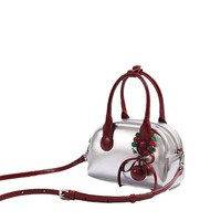 Sac à main pour femme en PU, nouvelle collection Printemps 2025, style sac coussin, porté épaule et bandoulière, taille moyenne, fermeture éclair simple, en polyester, haute qualité