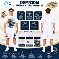 Ensemble deux pièces streetwear d'été pour homme : T-shirt respirant en mélange de coton tricoté à imprimé numérique motif néon Piranha et short