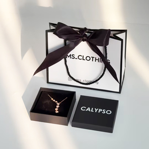 Elegant Edge Frame Design White <b>Paper</b> Gift Bag Customized Logo Service Cosmetic Store Retail Packaging Shopping Bags - Product Image 1