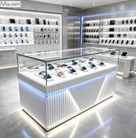 Table de présentation de téléphone portable Maxsen, en verre, avec éclairage LED ambiant, affichage numérique gris et blanc, robuste et écologique, pour usage commercial