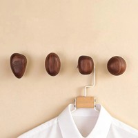 Crochet mural en noyer noir massif en forme de galet créatif, porte-manteau décoratif minimaliste, crochet mural en bois de style nordique