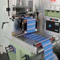 Machine de découpe d'étiquettes tissées Muller d'occasion Machine de découpe d'étiquettes de tissus d'habillement