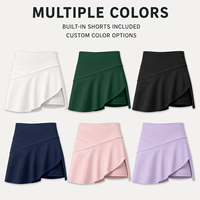 Jupe-short de tennis pour femmes, coupe irrégulière, avec short intégré, pour entraînement sportif et tenue de court.