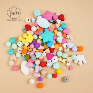 Vente en gros de perles rondes personnalisées de dentition de 9mm 12mm 15mm 19mm perles de silicone imprimées à motif en vrac pour stylos porte-clés