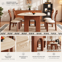 Table à manger ovale contemporaine en travertin, avec pieds en bois de frêne cintrés et plateau en pierre frittée, pour une décoration intérieure élégante