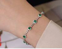 Parures de bijoux élégantes en or 10 carats avec pierres synthétiques, bracelet personnalisé en émeraude pour femmes, prix d'usine