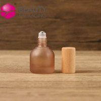 Flacon roll-on en verre givré 10 ml avec bouchon en bois et logo personnalisé, flacon vide pour huiles essentielles