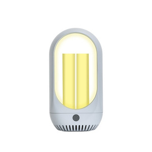 Mata mosquitos eléctrico con alimentación USB, trampa UV portátil con luz cálida para el hogar, dormitorio, sala de estar, uso en interiores - Product Image 1