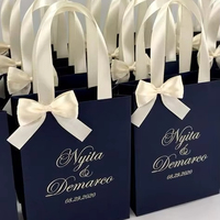 Emballage de sac cadeau Boutique de luxe personnalisé sacs cadeaux de remerciement en papier rose personnalisé avec poignée en ruban de soie imprimé Logo