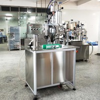 Ventes directes d'usine Petite machine de remplissage par pulvérisation d'aérosol Mini machine de remplissage de canettes d'aérosol Manuel de machine de remplissage