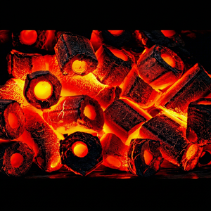 Briquetas de Carbón Vegetal Negro de Cáscara de Coco Hechas a Máquina, Forma Hexagonal con Orificio Central para Barbacoa, 5100-7500 Kcal/kg - Product Image 1