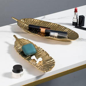 Plat <span class=keywords><strong>de</strong></span> service <span class=keywords><strong>de</strong></span> dîner fait à la main plat en grès <span class=keywords><strong>de</strong></span> luxe, feuilles <span class=keywords><strong>de</strong></span> banane dorées plateaux <span class=keywords><strong>de</strong></span> service décoratifs - Product Image 2