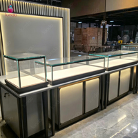 Vitrine d'exposition de bijoux sur mesure Sundo, comptoir de présentation, stand de salon professionnel, vitrine en verre avec mur arrière pour salon de bijouterie