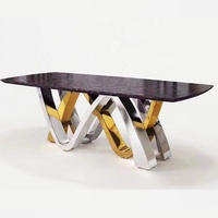 Ensemble de table à manger de conception royale du marché du mobilier de Foshan, moderne, 8 chaises, base en métal doré rose