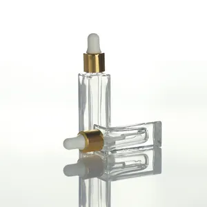 ユニークな化粧品シリンジボトルセラムドロッパー30mlアイヘアオイルボディケア空のホワイトゴールド琥珀色のプラスチックガラスドロッパーボトル