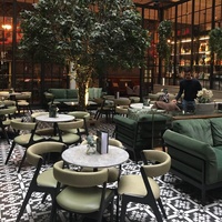 Meubles de café modernes d'Asie du Sud-Est Café en plein air Tables à manger artificielles en quartzstone Ensemble de chaises en bois Restaurant mexicain
