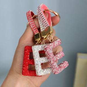 Porte-clés personnalisable 2026 pour femme, avec breloque de sac à main, motif d'amour, en cristal scintillant, lettre anglaise, jouet - Product Image 1