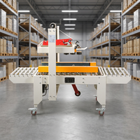 Máquina FXJ6050 con Correa para Encintado Superior e Inferior de Cajas con Dispositivo de Sellado de Cajas de Cartón Corrugado