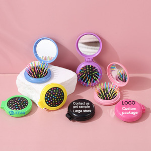Cepillo Desenredante Plegable Mini Compacto y Lindo, Redondo, Portátil, de Viaje, con Espejo de Maquillaje - Product Image 1